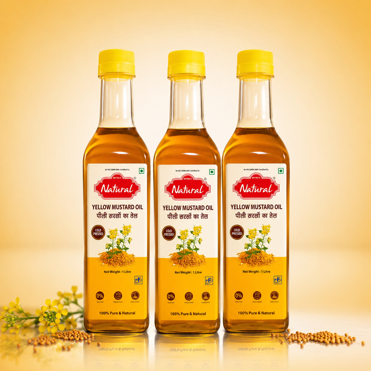 Three 1 litre bottles of Mittal's Natural Yellow Mustard Oil with red caps and yellow labels on a wooden table
